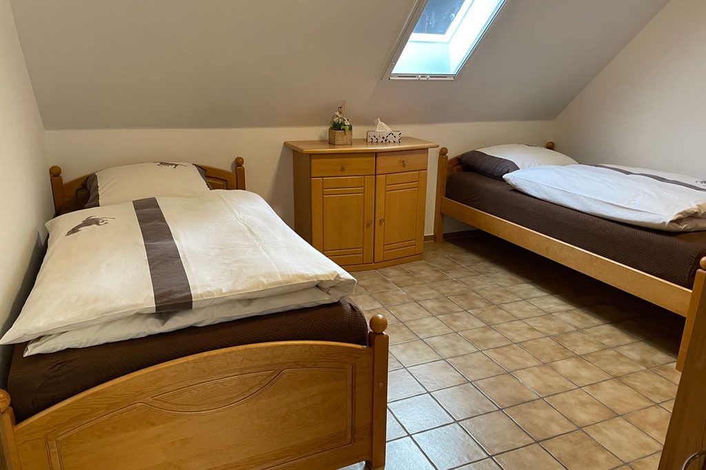Schlafzimmer der Gästewohnung